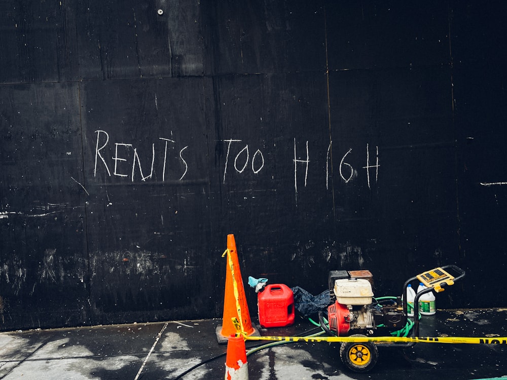 foreclosure eviction for roommates in chicago have been a problem for a long while, the image depicts graffiti that says rent is too high