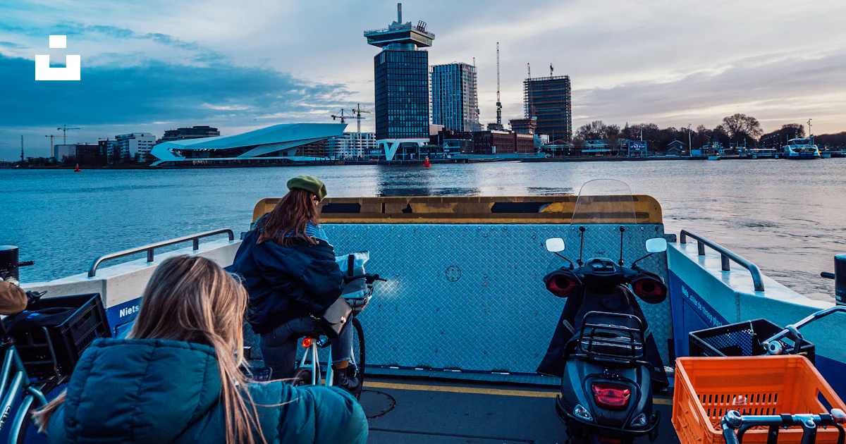 People riding on boat on sea during daytime photo – Free Amsterdam ...