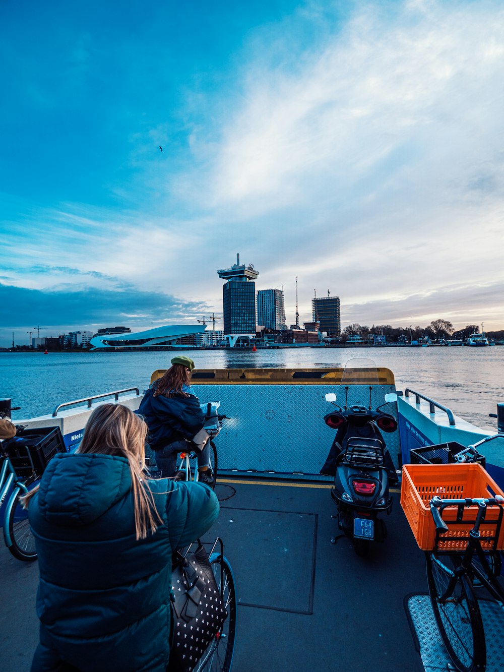 people riding on boat on sea during daytime