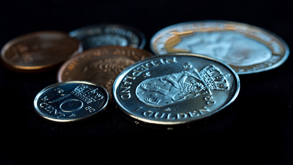 silver and gold round coins