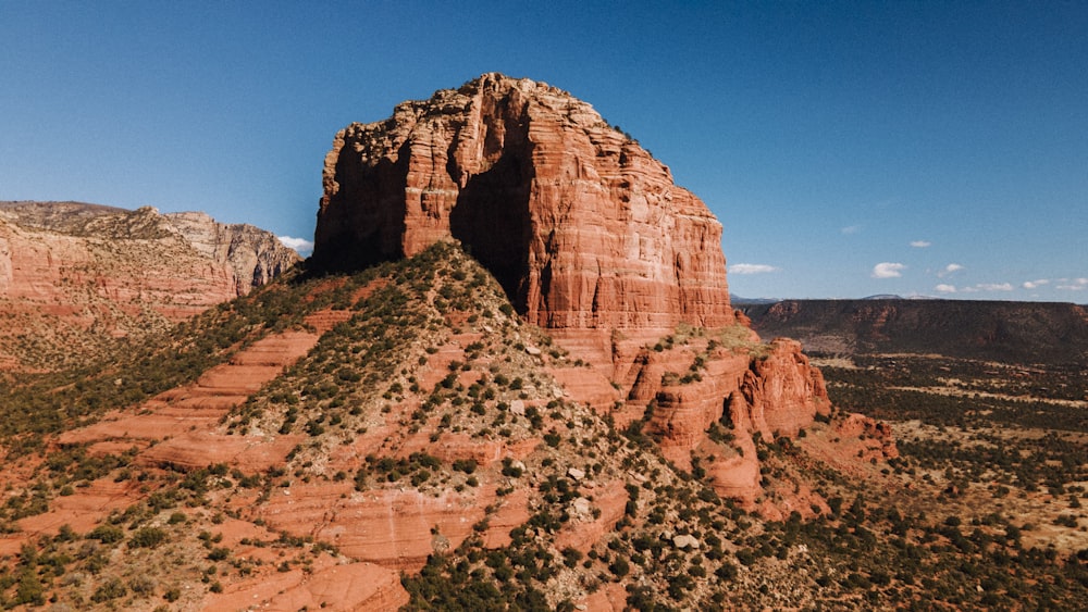 brown rocky mountain under blue sky during daytime