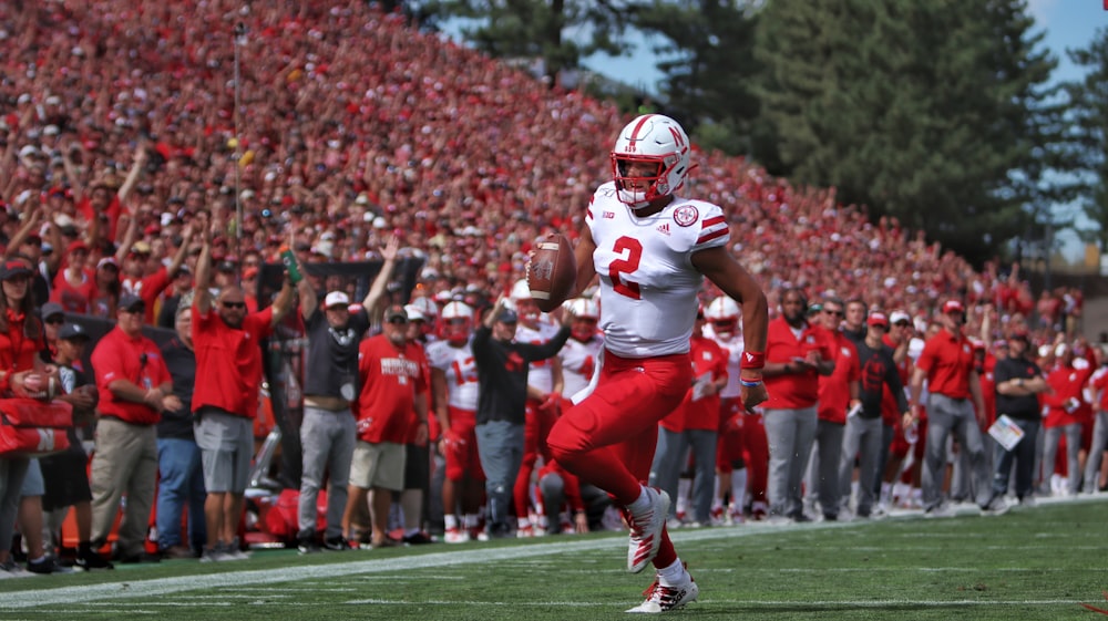 football players in red and white uniform