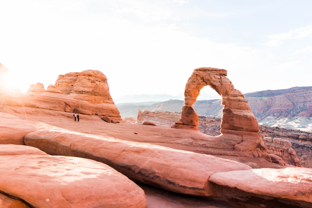 brown rock formation under white sky during daytime