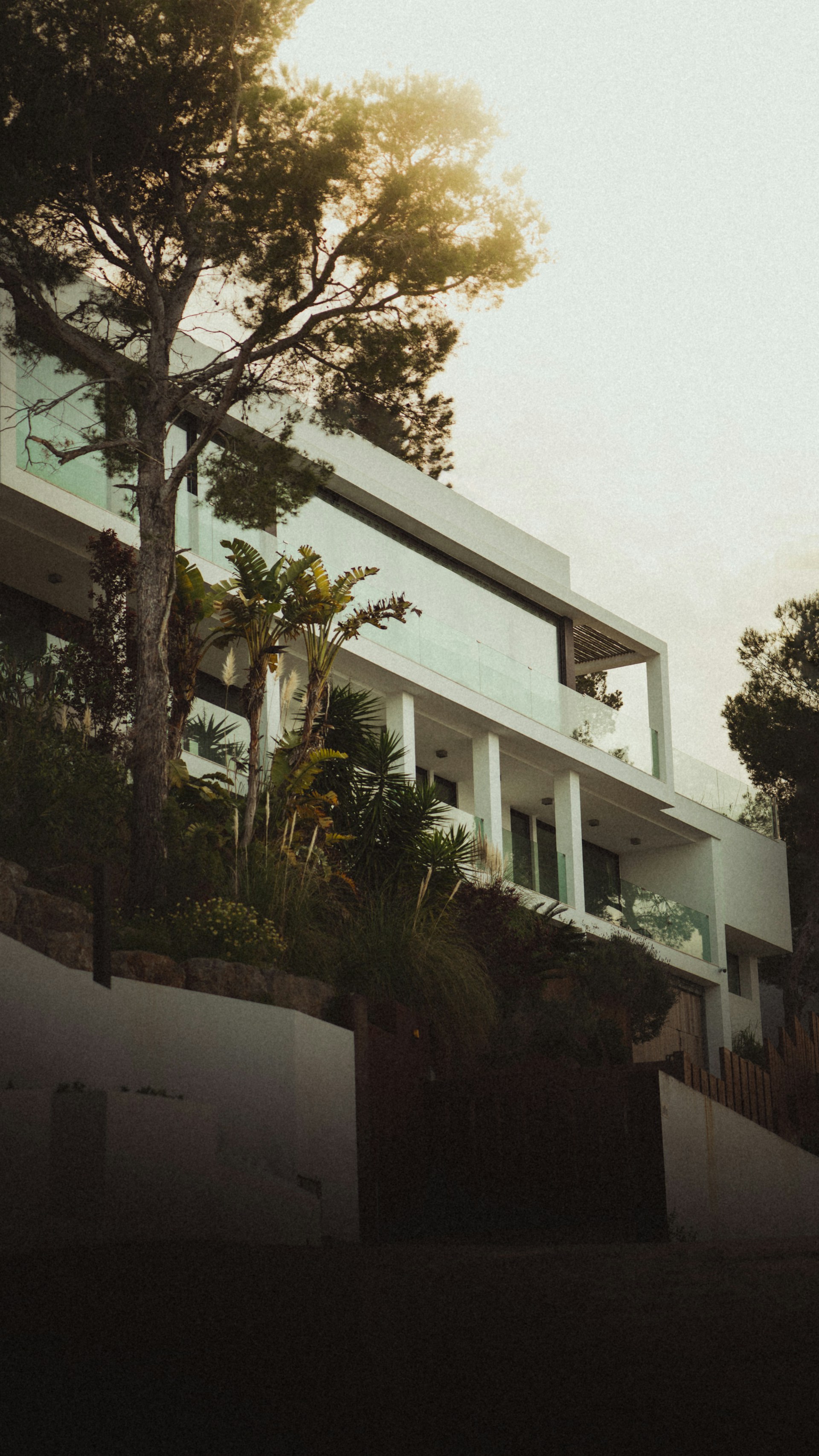 woman wearing yellow long-sleeved dress under white clouds and blue sky during daytime