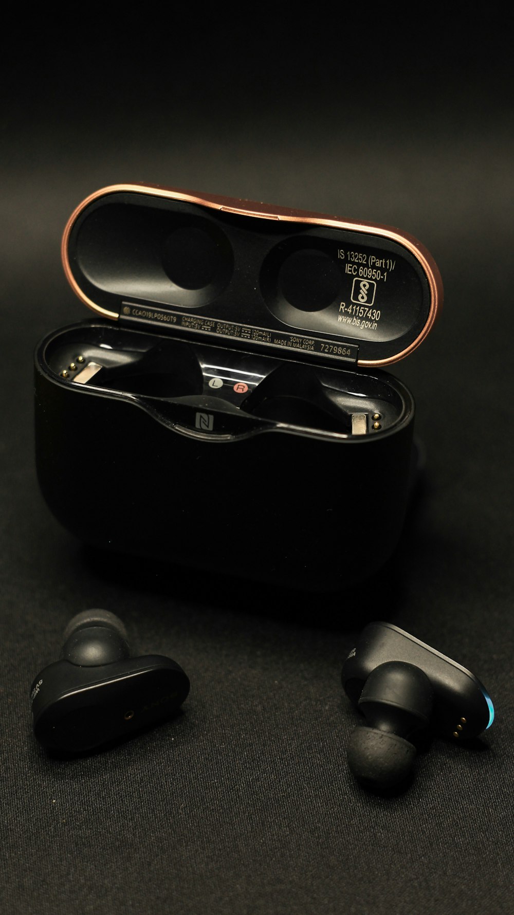 a pair of ear buds in a case