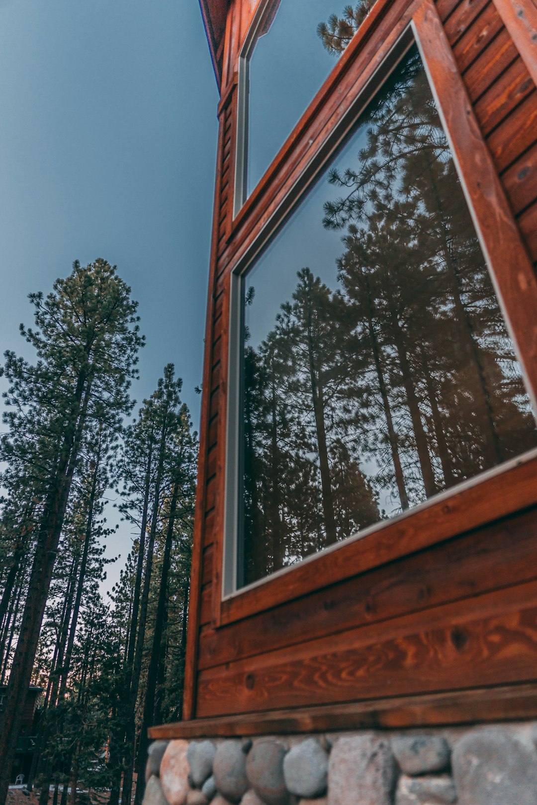 brown wooden framed glass window