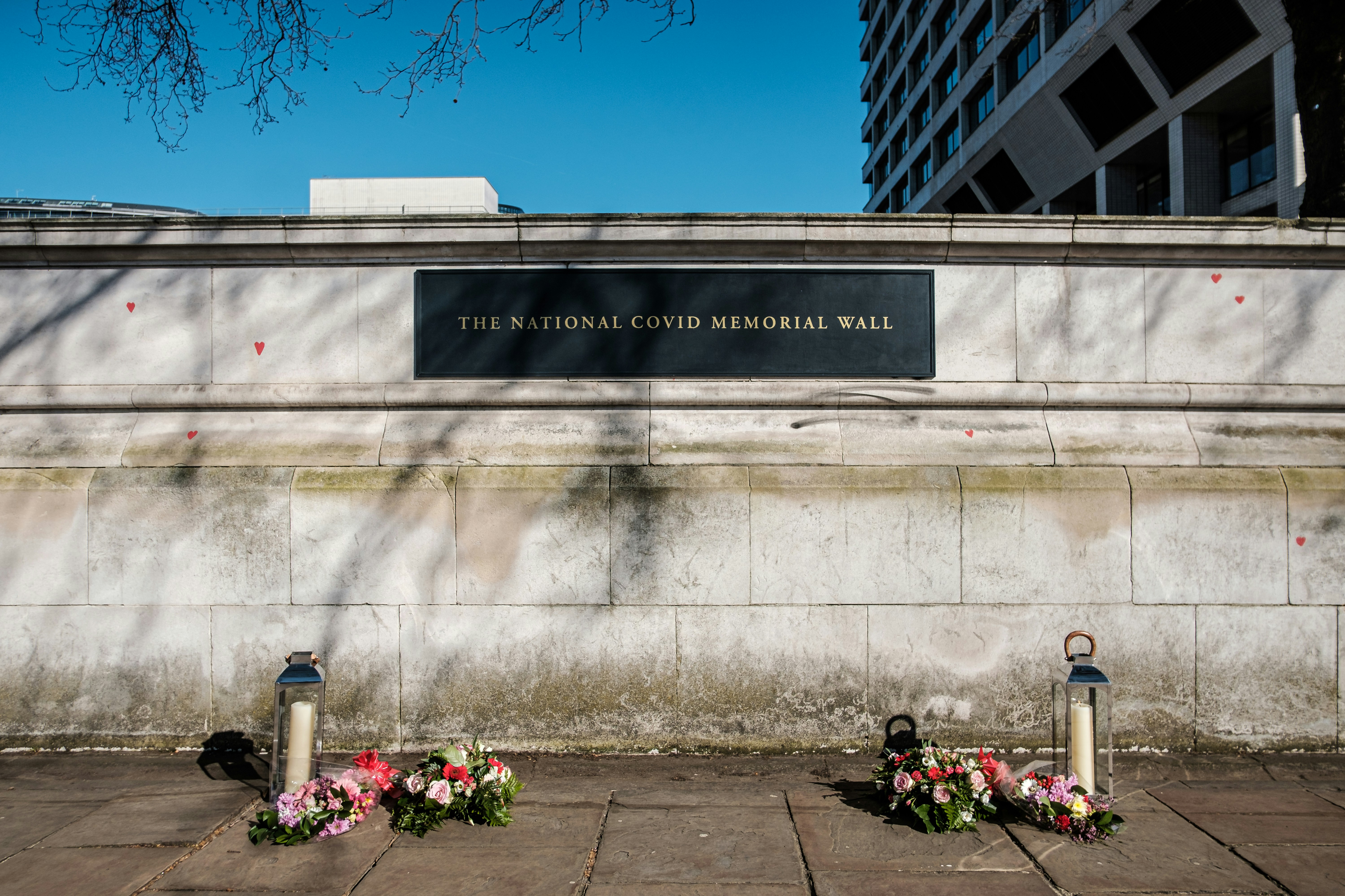 It has been over a Year since Coronavirus struck and shut down the UK; Today Near St Thomas Hospital a National Memorial has been set up to allow people to pay their respects and to mark the walls of the Queen's Walk with Love Hearts, Labour Leader Keir Starmer made is the presence and talked to the few who spent most of today adding Hearts to the walls.
