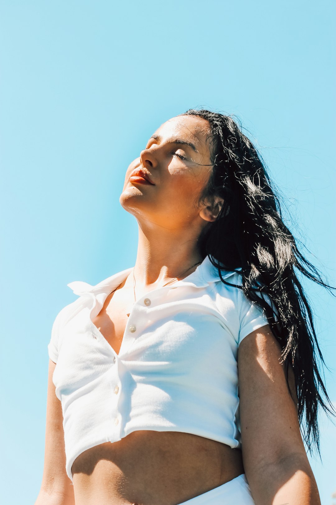 woman in white button up shirt