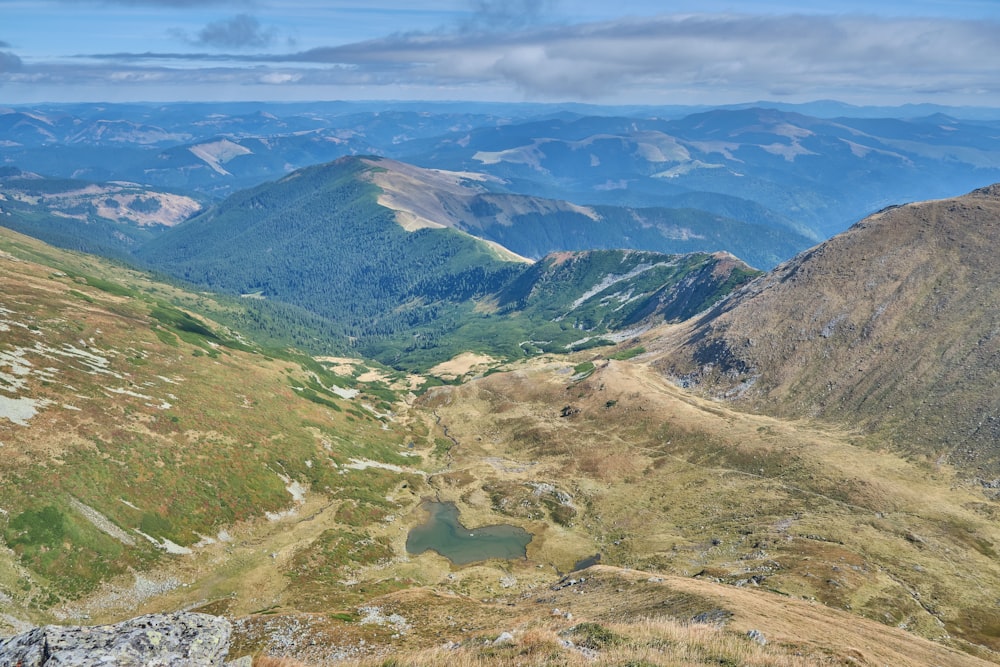 green mountains under blue sky during daytime