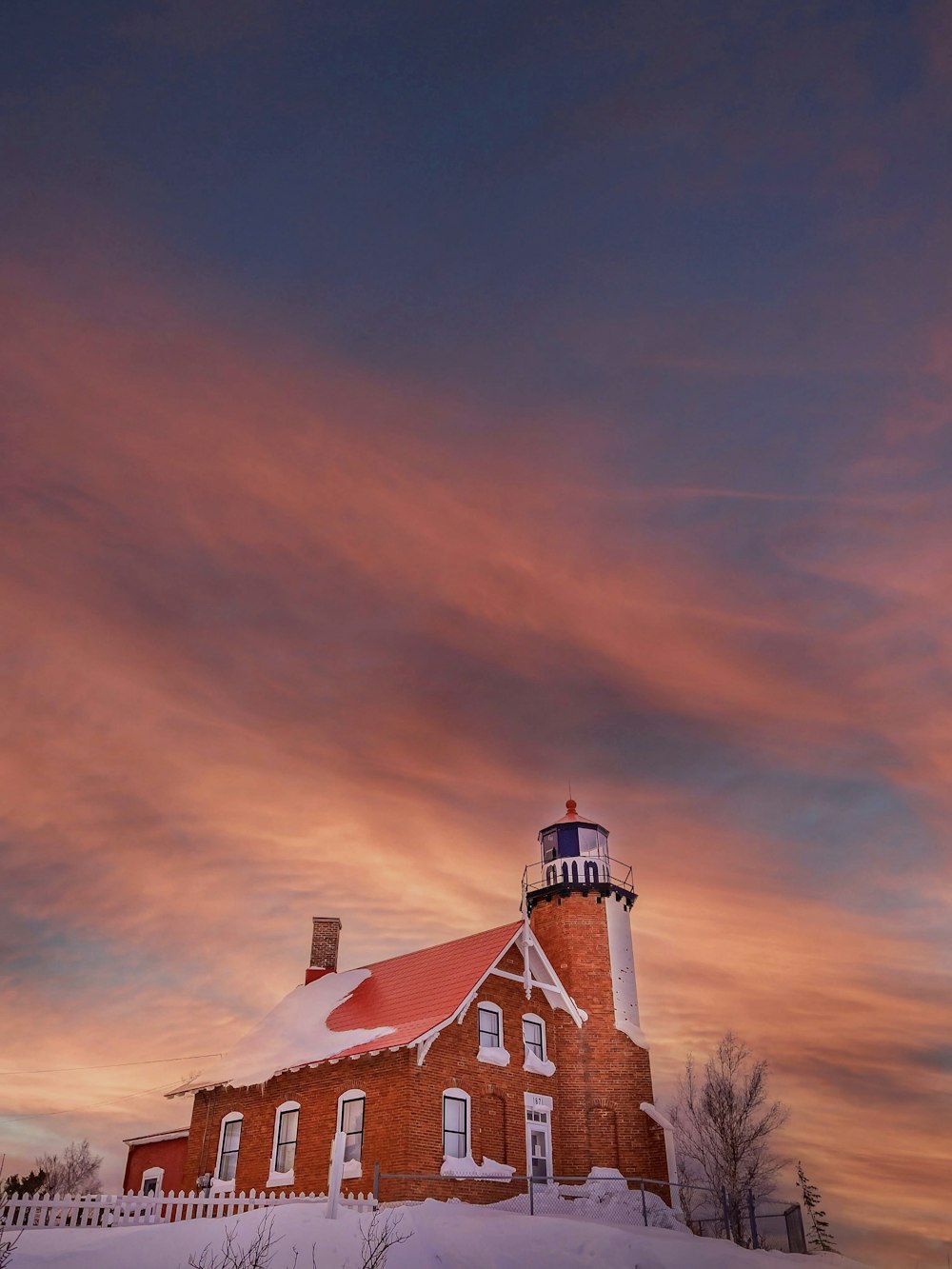 white and red concrete house under blue sky