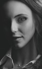 grayscale photo of womans face