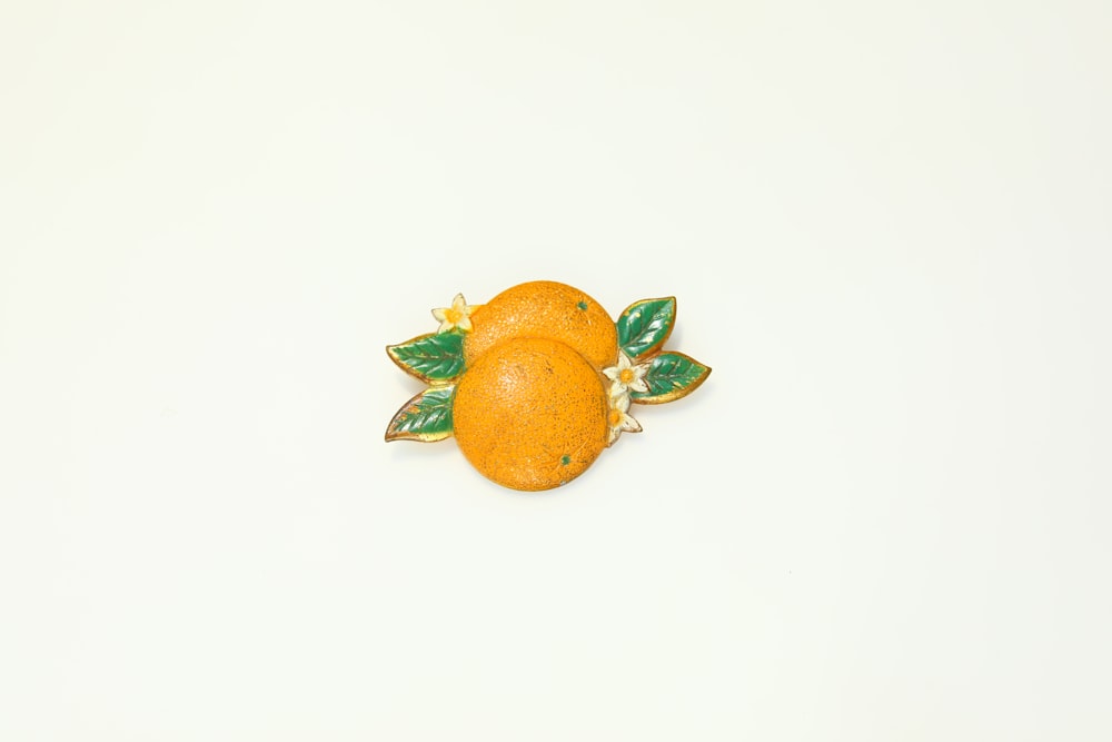 orange fruit on white table