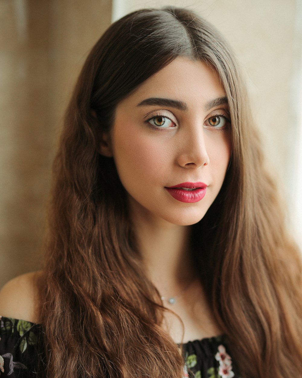 woman in green and black sleeveless top