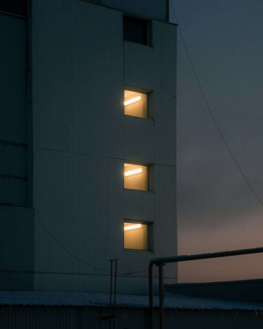 black and white building during night time