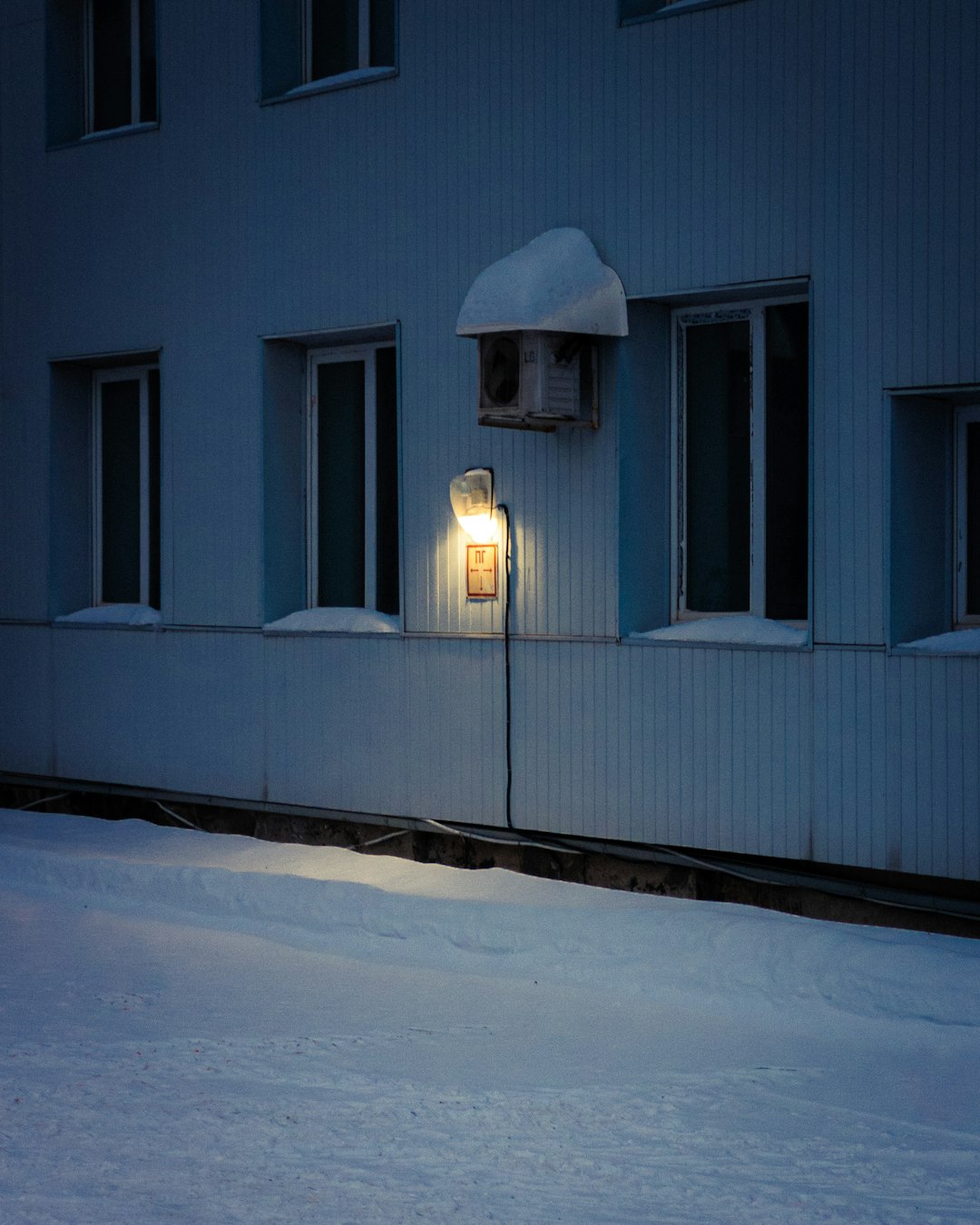 white and blue wooden house during daytime