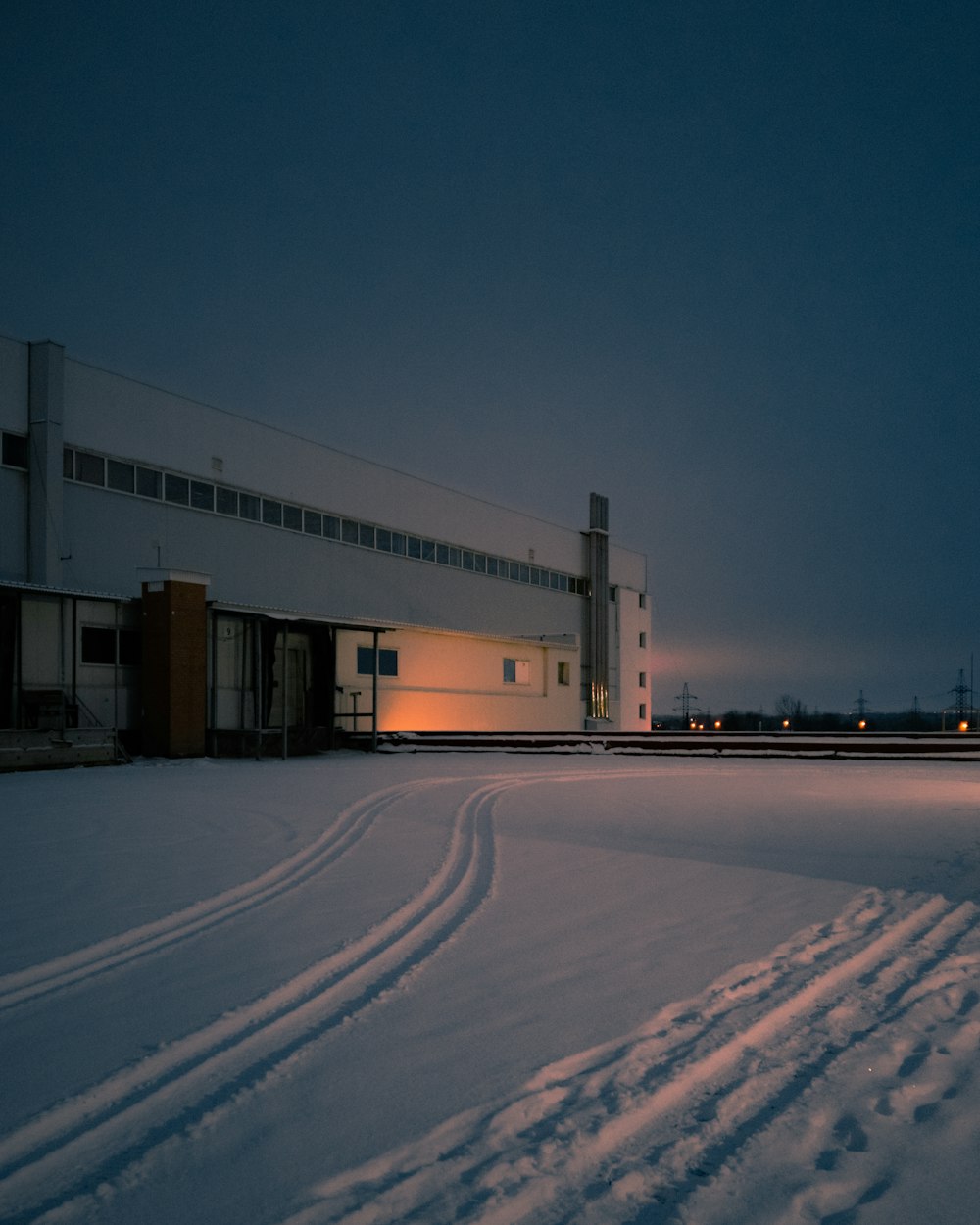 white and brown building during night time