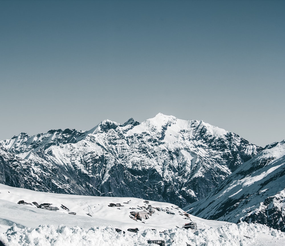 snow covered mountain under blue sky during daytime