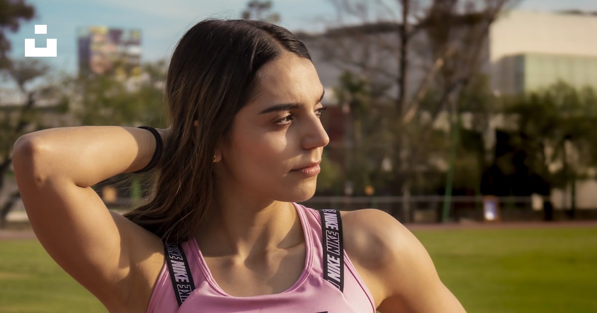 Woman in pink nike sports bra and black shorts photo – Free León Image on  Unsplash