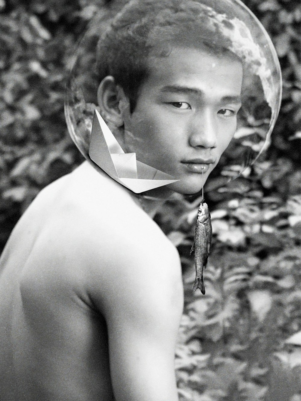 topless woman with white paper on her head