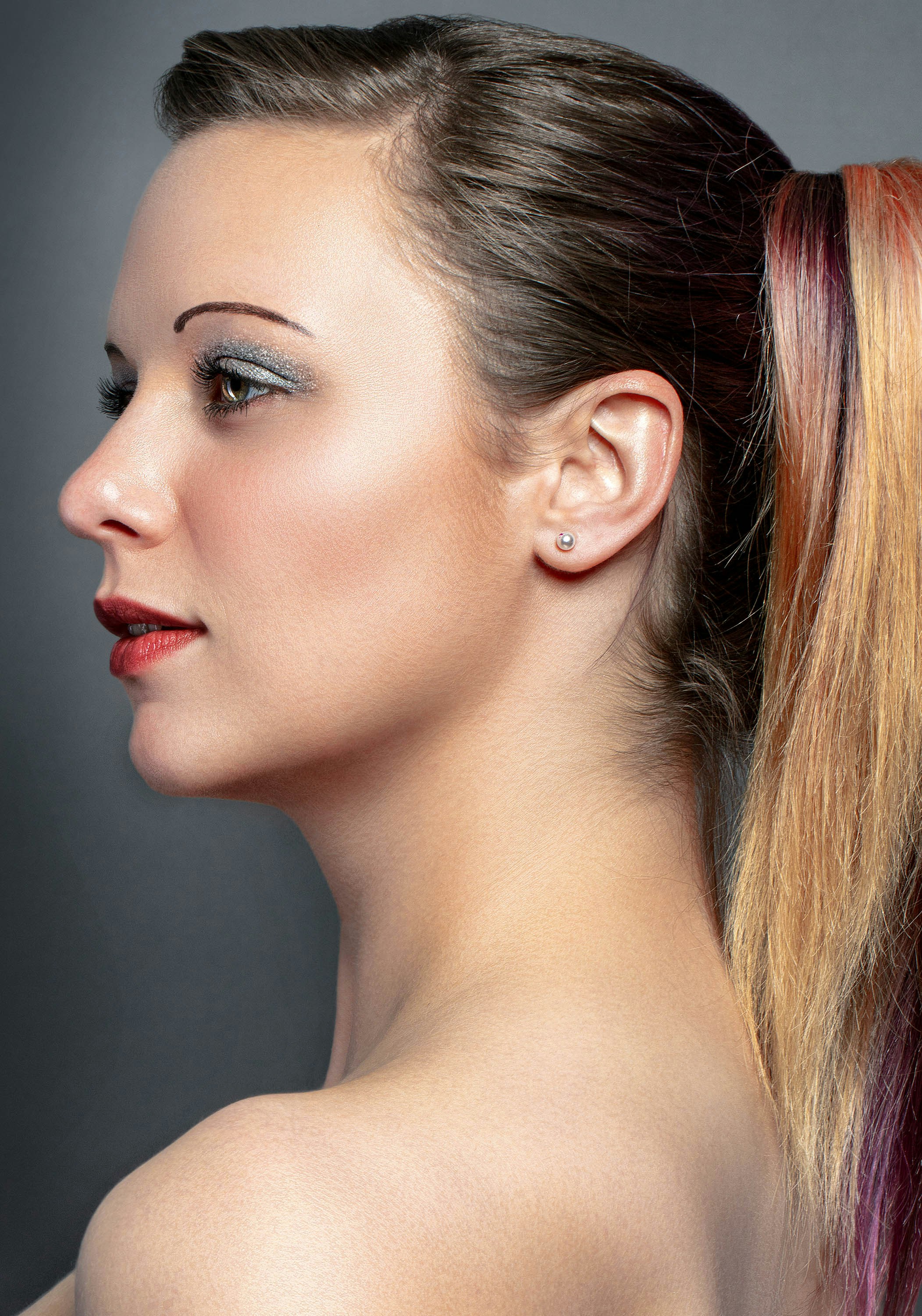 woman with brown hair and red lipstick