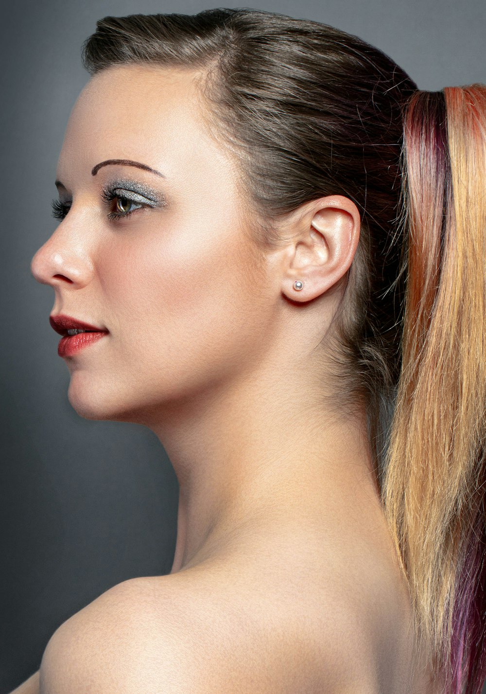 woman with brown hair and red lipstick