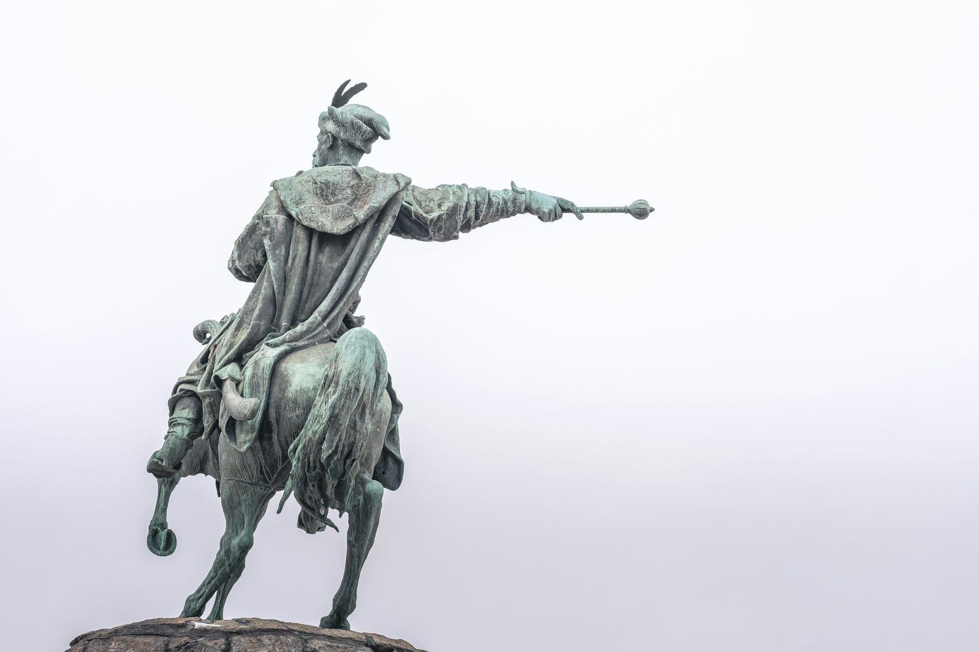 man riding on horse statue