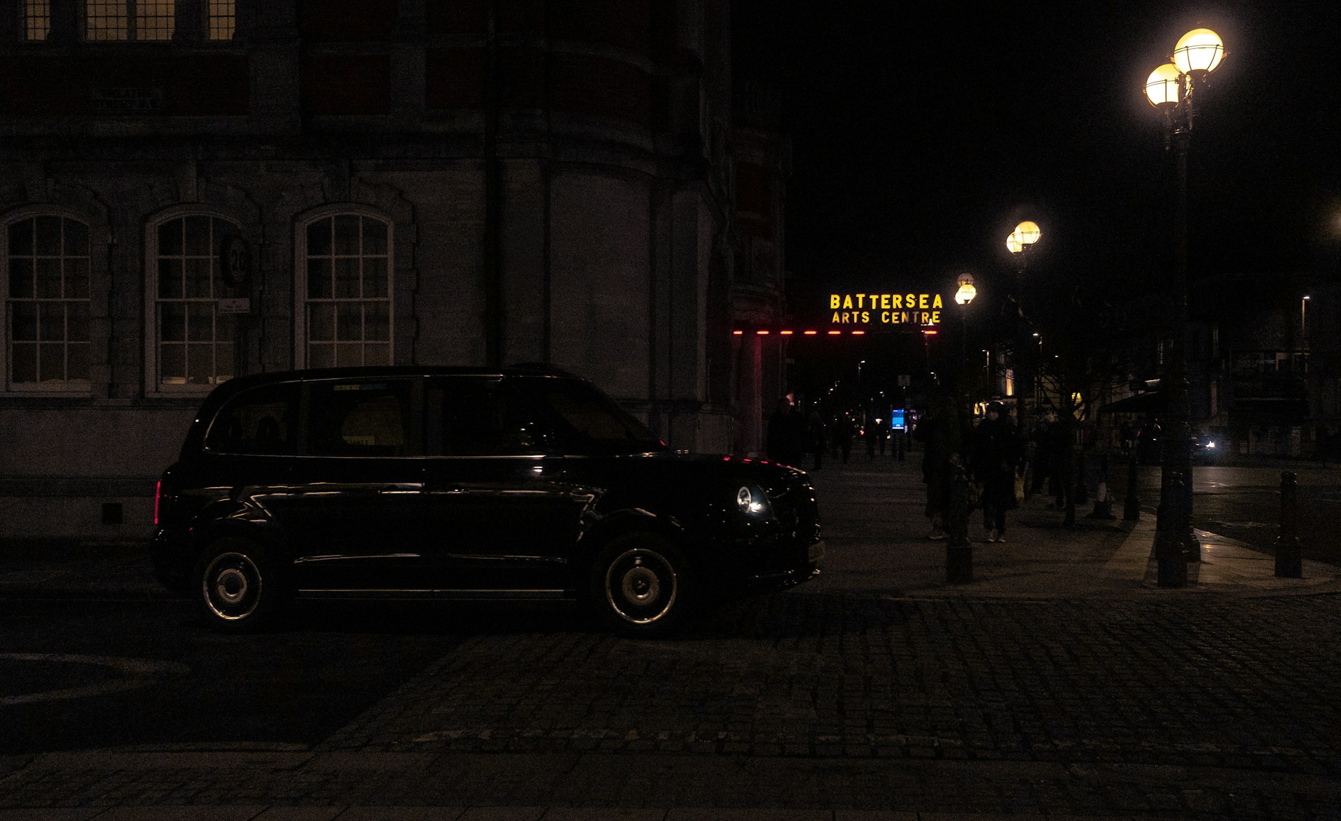 woman wearing yellow long-sleeved dress under white clouds and blue sky during daytime