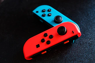 Colorful pixel art joystick and keyboard icons side by side, inviting players and learners alike.