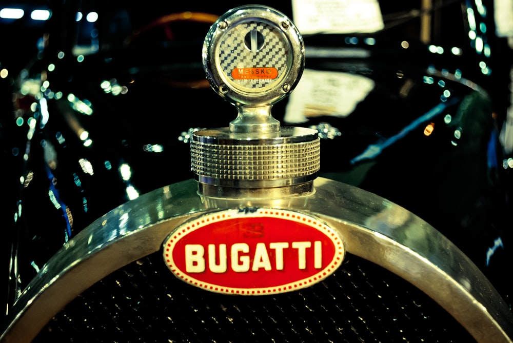 a close up of a bugatt emblem on a car