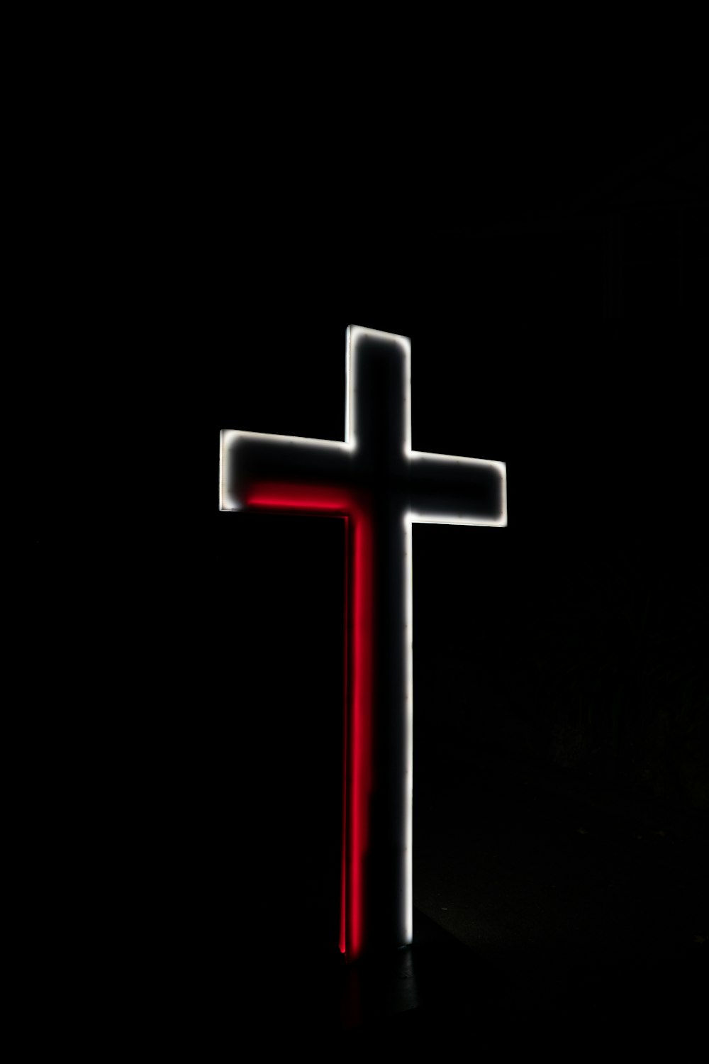 red cross with black background