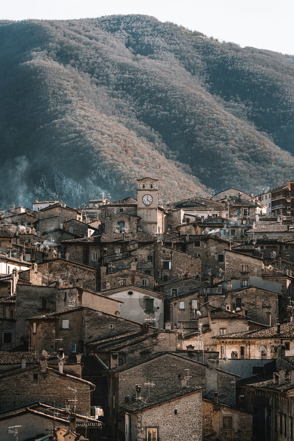 aerial view of city near mountain during daytime