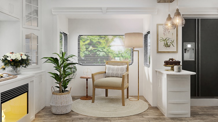 A warm, minimalist living room with soft lighting, natural textures, and tasteful décor accents.