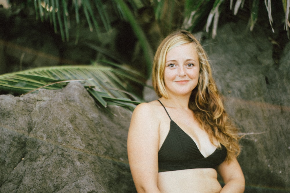 woman in black bikini top