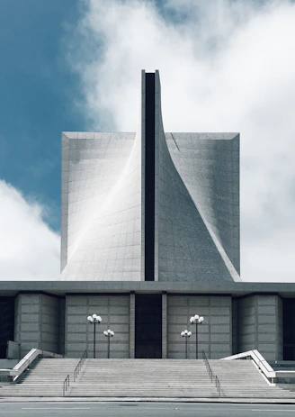 gray concrete building under blue sky during daytime