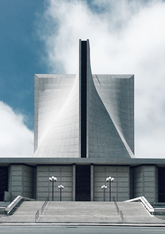 gray concrete building under blue sky during daytime