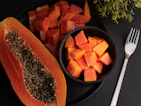 sliced carrots on black plate
