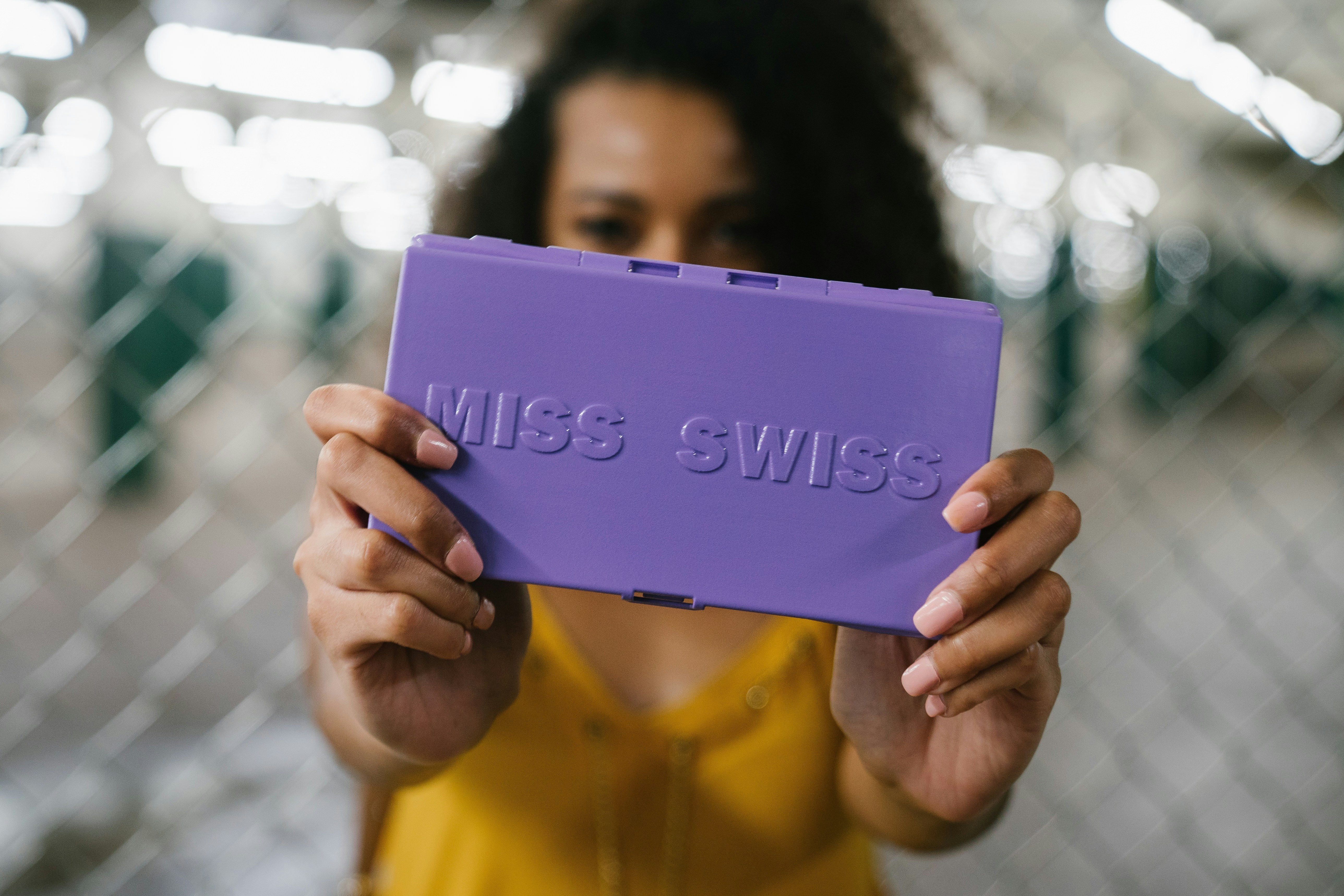 text, MISS SWISS helps makeup wearers with glamour on the go no matter where their travels take them. The MISS SWISS makeup case was created from a personal purse catastrophe. It helps you apply your makeup easily on the go, prevents your makeup from spilling, and to prevent your makeup from getting lost. It is the perfect something blue for your wedding day. Touching up your makeup after your ceremony or between photos is a breeze.