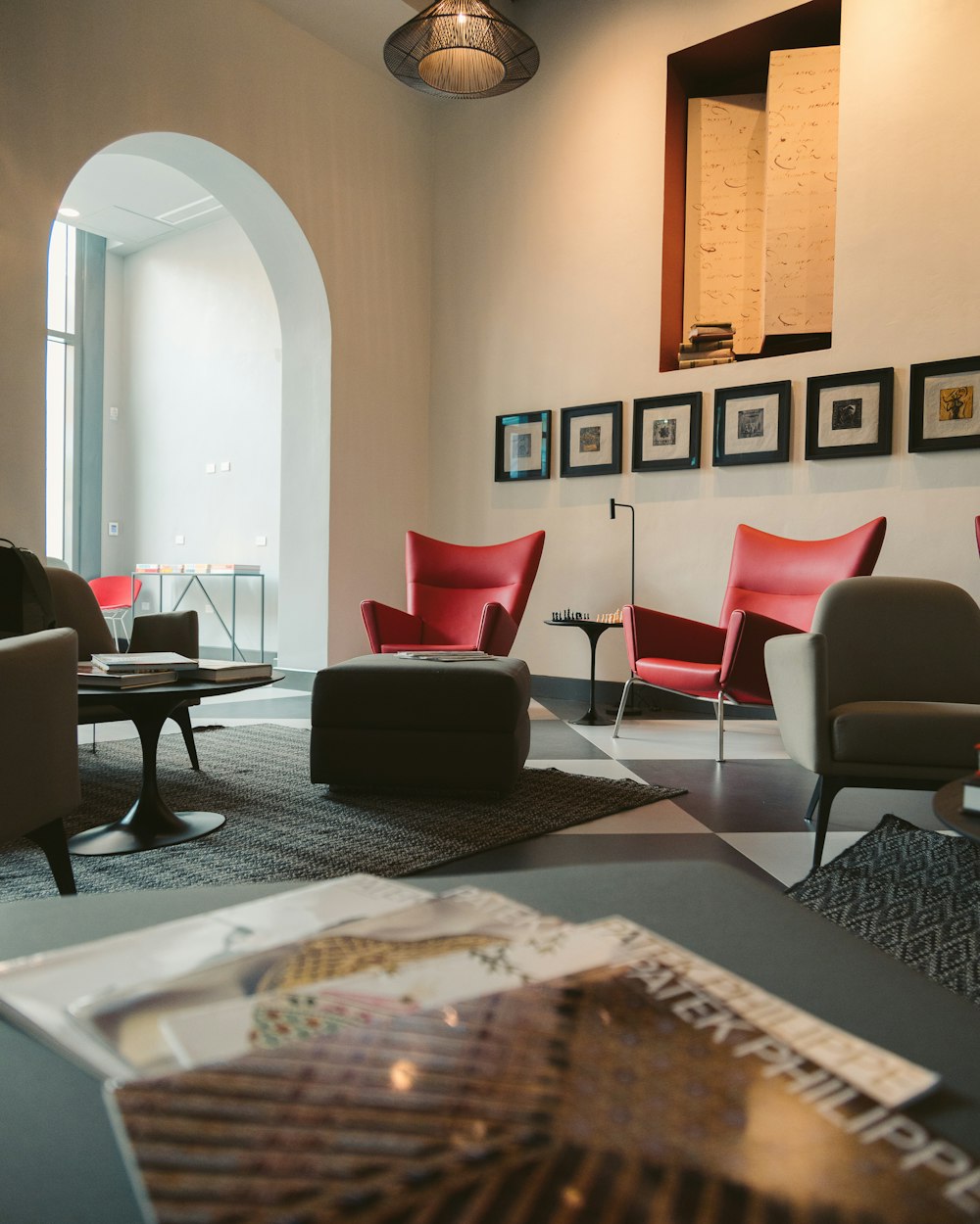 black and red padded armchairs