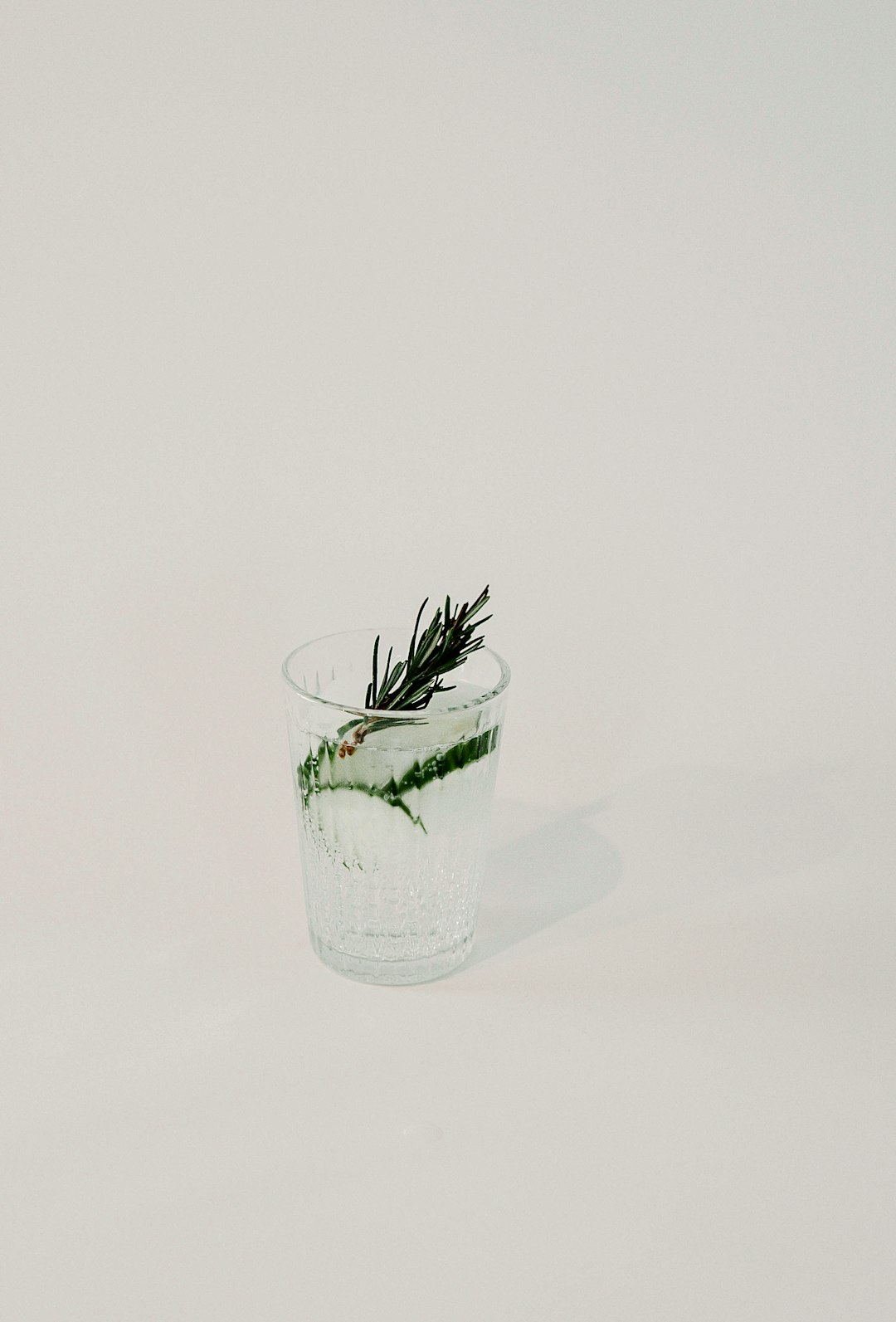 green plant in clear glass