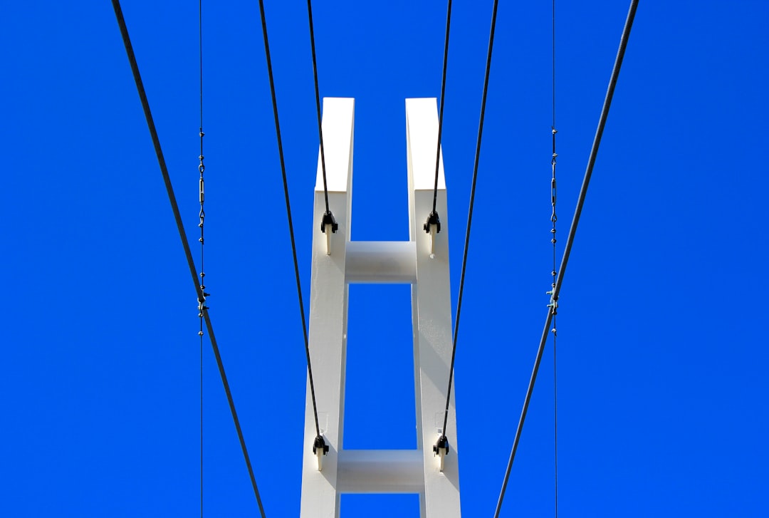 white metal frame with blue background