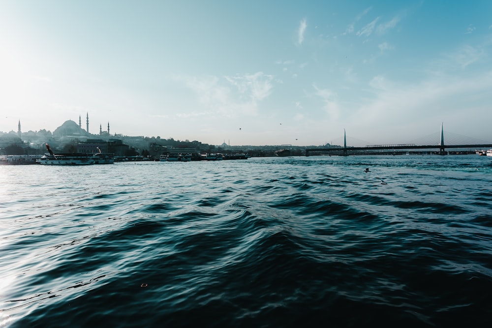 body of water under blue sky during daytime