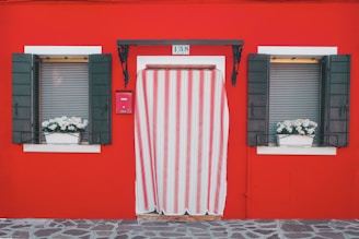 red and white wooden door