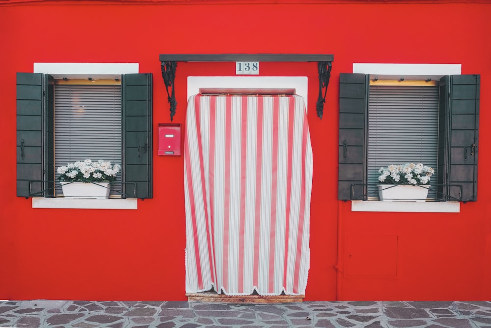 red and white wooden door