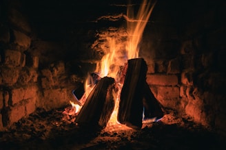 fire in brown concrete brick