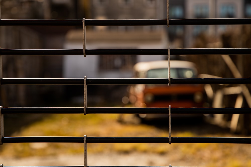 black metal frame on brown field during daytime