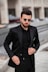 man in black suit jacket and black sunglasses