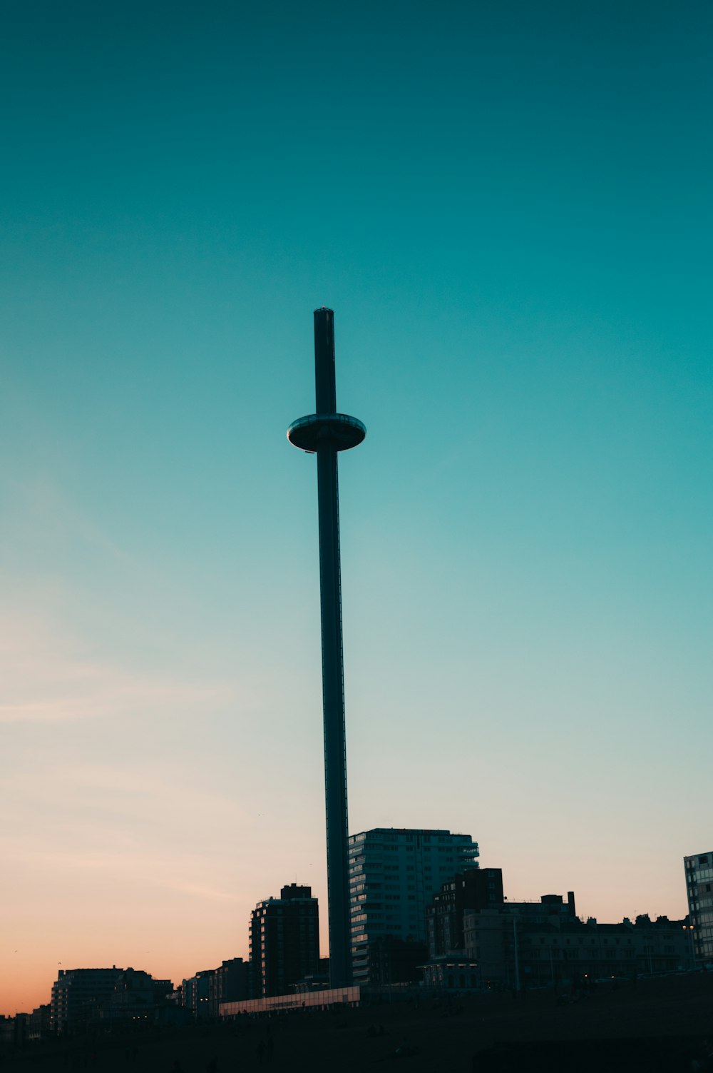 black and white high rise building under blue sky during daytime