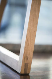 Close-up of natural materials like wood and stone in a minimalist interior.