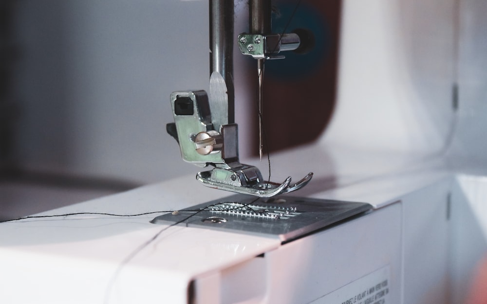 red and silver sewing machine