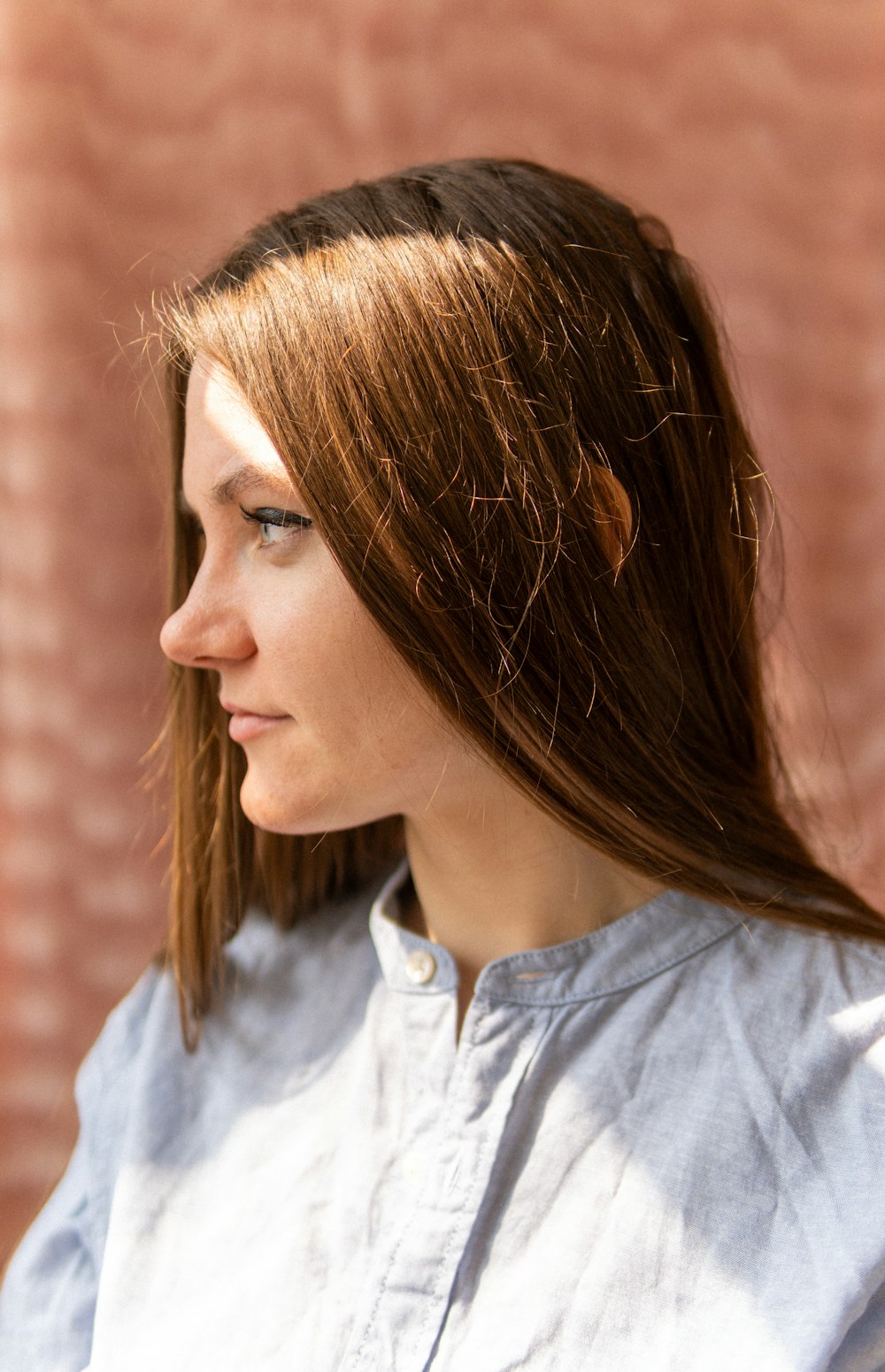 woman in blue button up shirt